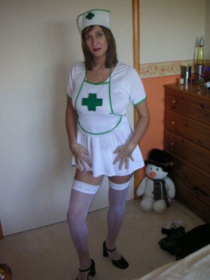 This sexy naughty Milf is wearing a little nurses uniform. She is playful in the bedroom, there are lots of upskirt shots. She is wearing se; Amateur Hot Milf Uniform 