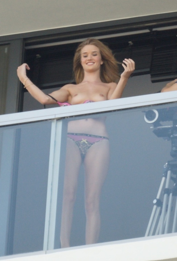 Rosie Huntington-Whiteley topless on a balcony; Babe 