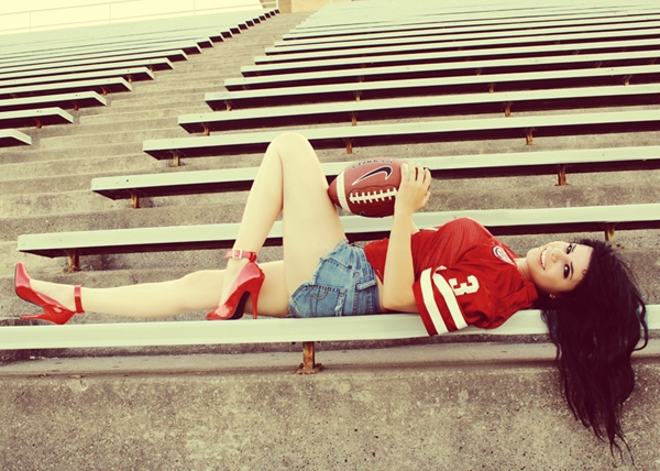 Nebraska Corn Huskers Female Football Model Shoot; Amateur Brunette 